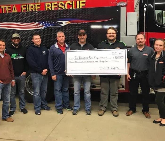 SERVPRO of Sioux Falls team presenting donation to Tea Volunteer Fire Department