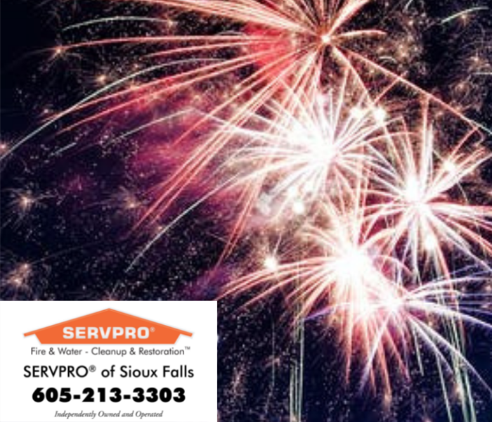 Fireworks display and SERVPRO of Sioux Falls logo