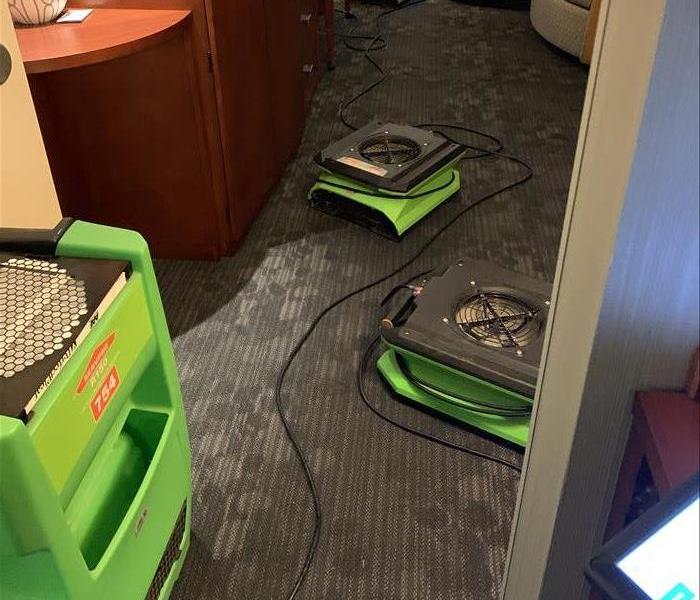 Green SERVPRO drying equipment being used in a Sioux Falls 
